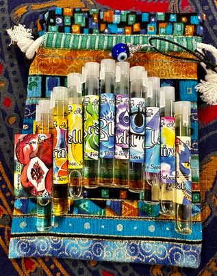 Chakra-inspired perfume potions for balancing, aligning, and amplifying chakras. Trial vial oil perfume bottles.
