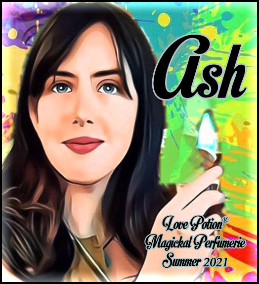 Image of perfume label featuring stylyzed photo of a woman on a multicolored splash painted background.