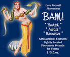 Love Potion: BAM pheromone label featuring pinup of woman dancing with a snake.