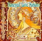 Love Potion perfume label featuring honey-colored Alphonse Mucha artwork of woman's face in profile.