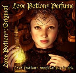 Love Potion Perfume: Original label featuring young red haired woman holding a glowing potion bottle. 