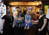 Group employee photo at Love Potion Magickal Marketplace, including the label girl.